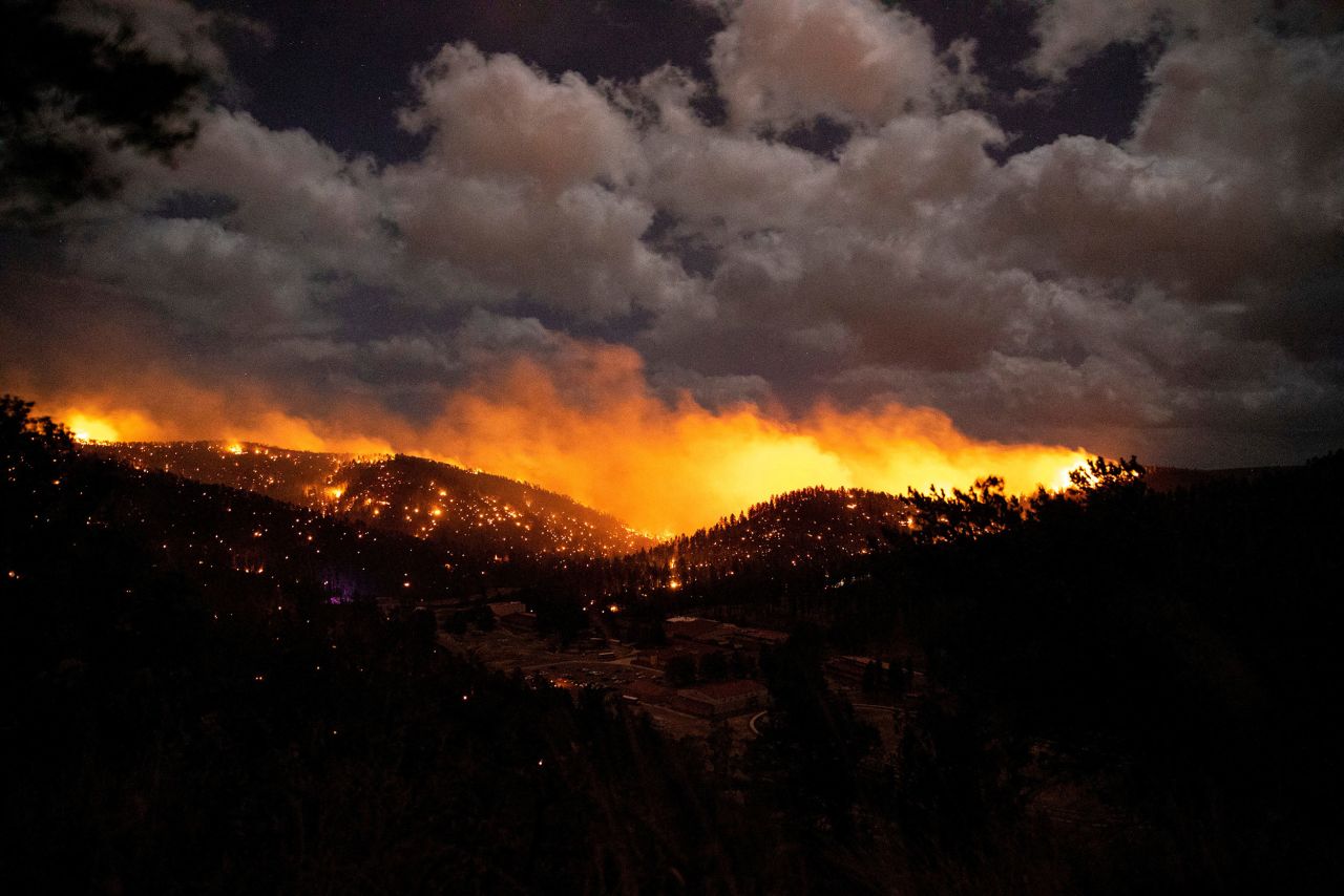 The McBride Fire burns in Ruidoso, New Mexico, on Tuesday, April 12. <a href="https://www.cnn.com/2022/04/14/weather/new-mexico-wildfires-thursday/index.html" target="_blank">The wildfire</a> has scorched more than 5,000 acres and forced evacuations in the Sierra Blanco mountain range, police said. At least two people have died.