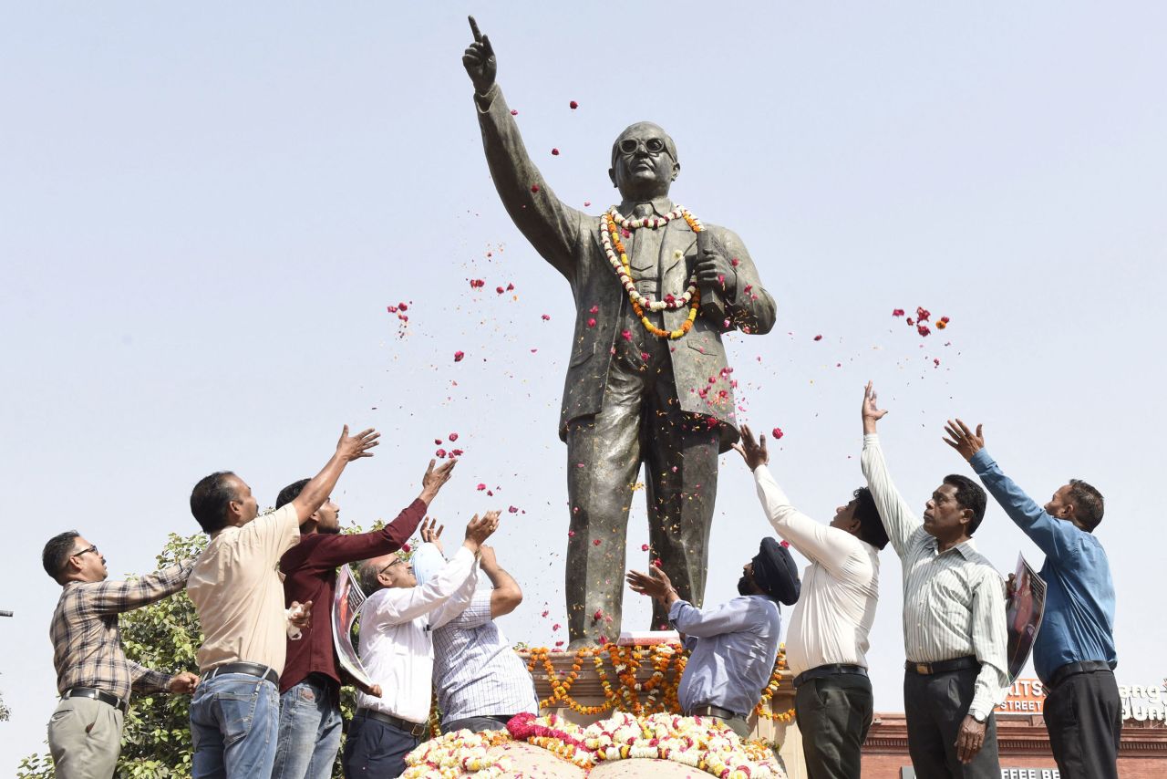 People pay tribute to social reformer B.R. Ambedkar at his statue in Amritsar, India, on Thursday, April 14. Ambedkar was born on April 14, 1891, and he died in 1956.