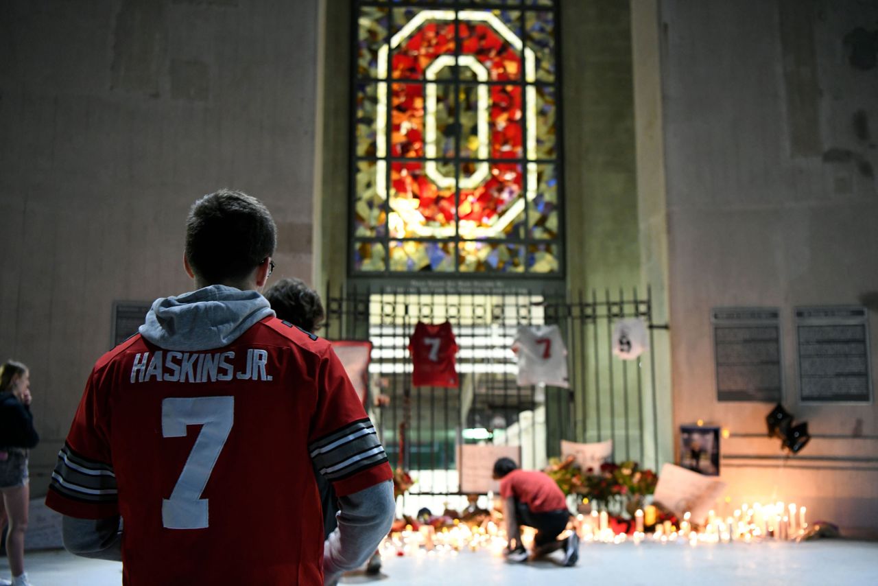 Fans in Columbus, Ohio, attend a candlelight vigil that was held at Ohio Stadium for NFL quarterback Dwayne Haskins on Tuesday, April 12. Haskins, a former star at the Ohio State University, <a href="https://www.cnn.com/2022/04/11/us/dwayne-haskins-death-what-we-know/index.html" target="_blank">was fatally struck by a dump truck</a> April 9 as he tried to cross a highway on foot in South Florida, authorities said. He was 24 years old.