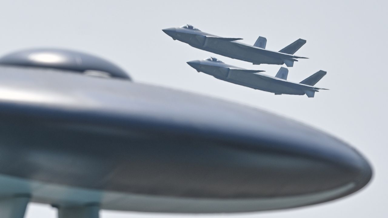 Two J-20 stealth fighter jets perform in the sky during Airshow China 2021 last September in Zhuhai, China.