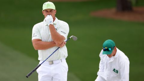 DeChambeau looks on from the seventh green during the second round of The Masters.