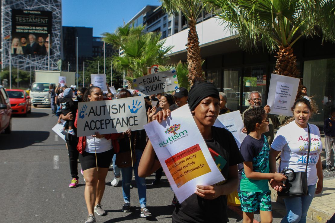 A group marches this month in Cape Town, South Africa, to demand  services and support for families with children who are autistic.