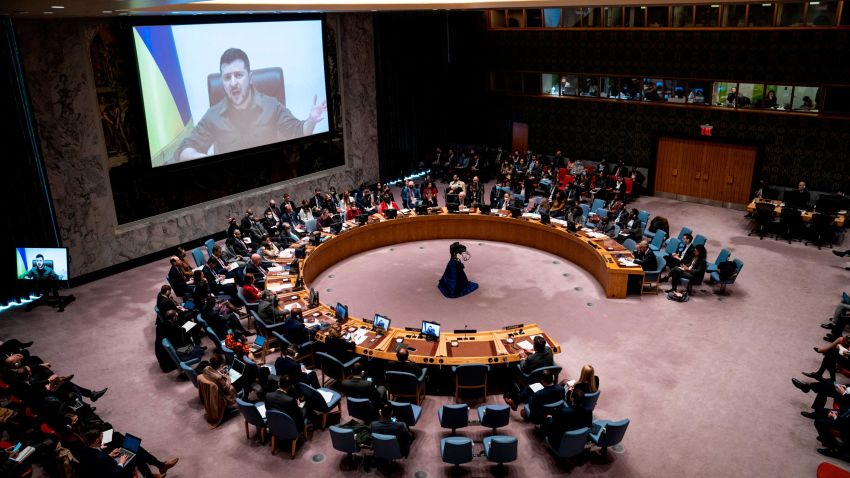 Ukrainian President Volodymyr Zelenskyy speaks via remote feed during a meeting of the UN Security Council, Tuesday, April 5, 2022, at United Nations headquarters.  Zelenskyy will address the U.N. Security Council for the first time Tuesday at a meeting that is certain to focus on what appear to be widespread deliberate killings of civilians by Russian troops. (AP Photo/John Minchillo)