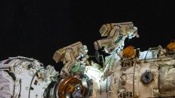 Cosmonauts Anton Shkaplerov, left and Pyotr Dubrov,right, work to outfit the Nauka multipurpose laboratory module during a seven-hour and 11-minute spacewalk Jan. 19, 2022.