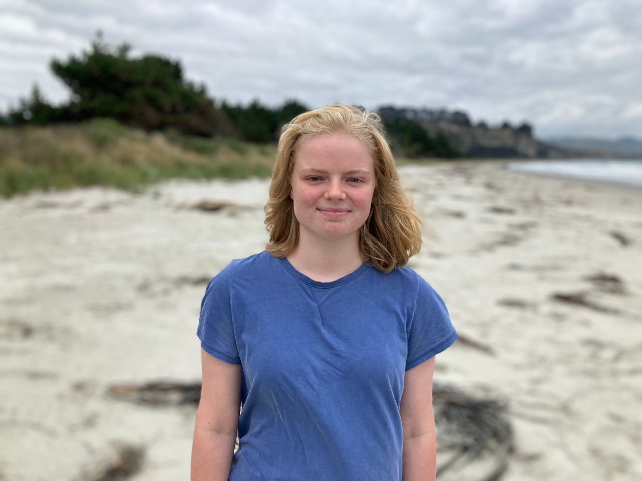 Babysitter Hannah Yeardley hopes that by looking after New Zealand sea lion pups she can help the population grow.