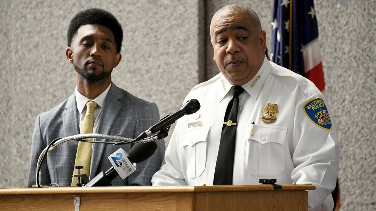 Baltimore Mayor Brandon Scott, left, and Police Commissioner Michael Harrison announced a new staffing vision for the Baltimore Police Department. 