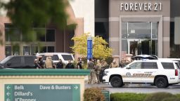 Members of law enforcement gather outside Columbiana Centre mall in Columbia, S.C., following a shooting, Saturday, April 16, 2022. (AP Photo/Sean Rayford)
