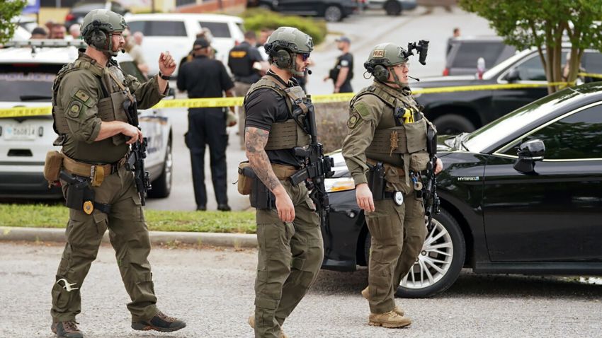 Authorities stage outside Columbiana Centre mall in Columbia, S.C., following a shooting, Saturday, April 16, 2022. (AP Photo/Sean Rayford)