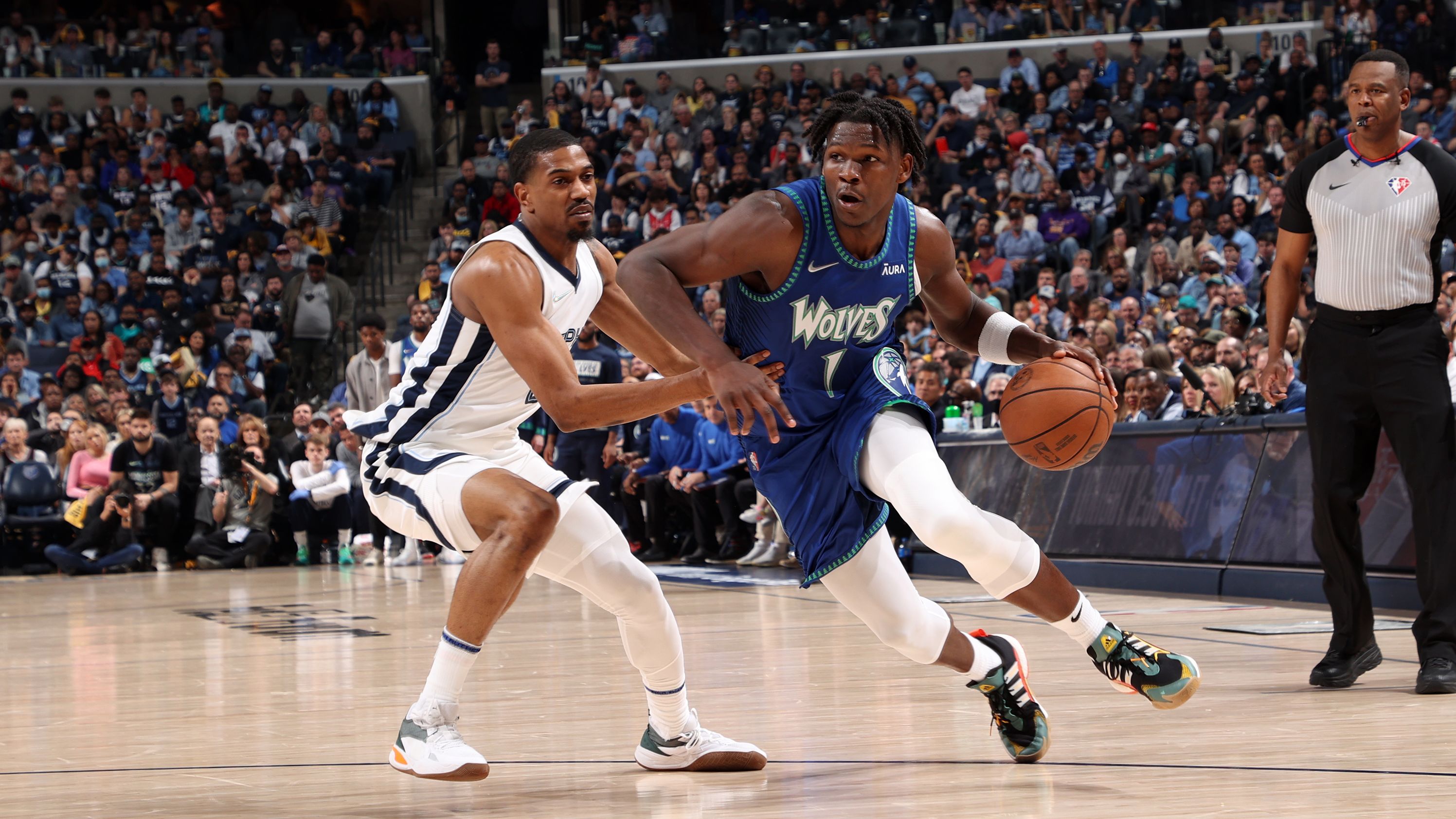 T-Wolves guard Anthony Edwards drives to the basket against the Memphis Grizzlies.