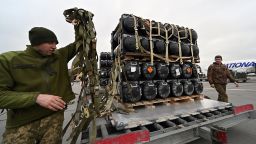Ukrainian servicemen unload a Boeing 747-412 plane with the FGM-148 Javelin, American man-portable anti-tank missile provided by US to Ukraine as part of a military support, at Kyiv's airport Boryspil on February 11.