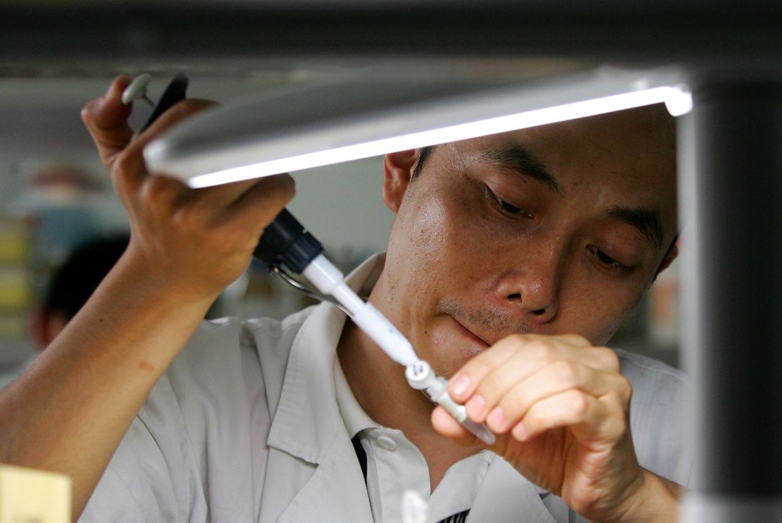 A Chinese scientist works at a medical genetics laboratory at the Central South University in Changsha, China, in 2006.