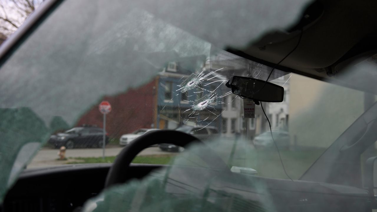 PITTSBURGH, PA - APRIL 17: Bullet holes are seen in a van parked outside an Airbnb apartment rental along Suismon Street on April 17, 2022 in Pittsburgh, Pennsylvania. Last night, a shooting at a house party at the rental left two people dead and nine injured.