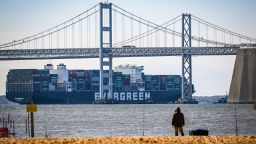 Evergreen Marine's Ever Forward container ship passes under the Chesapeake Bay Bridge after it was freed from mud outside the shipping channel off Pasadena, Md., where is had spent the past month aground.