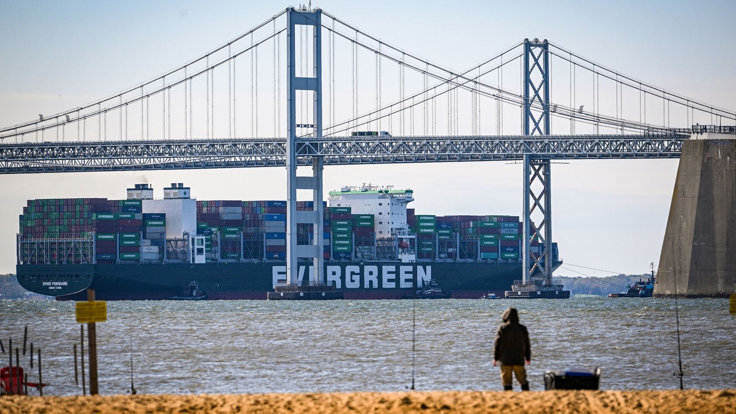 Evergreen Marine's Ever Forward container ship passes under the Chesapeake Bay Bridge after it was freed from mud outside the shipping channel off Pasadena, Md., where is had spent the past month aground.