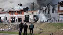 LVIV, UKRAINE - APRIL 18: Firefighters battle a blaze after a civilian building was hit by a Russian missile on April 18, 2022 in Lviv, Ukraine. At least six people were killed and eight wounded in missile strikes in different areas of the city, according to the governor. (Photo by Joe Raedle/Getty Images)