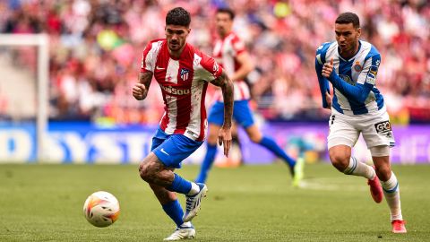 Rodrigo de Paul and Raul de Tomas during La Liga match between Atletico de Madrid and RCD Espanyol de Barcelona at Wanda Metropolitano on April 17, 2022.