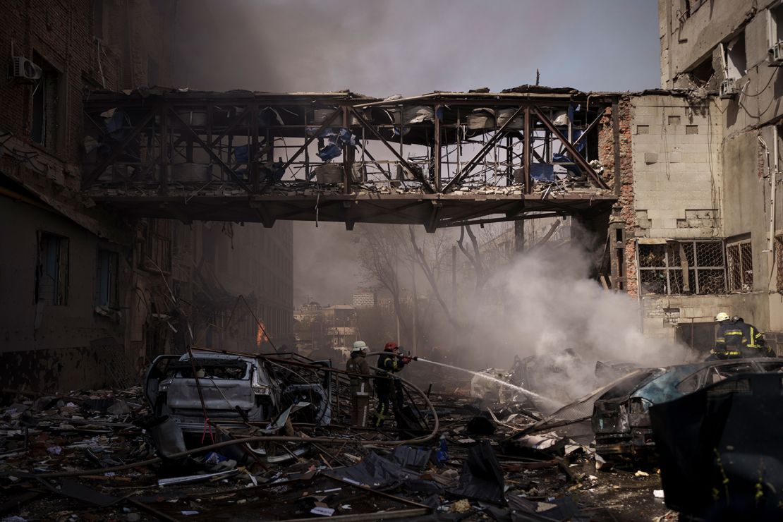 Frefighters at the scene after a Russian missile struck a restaurant partnered with the World Central Kitchen in the northeastern city of Kharkiv, Ukraine on Saturday April 16.