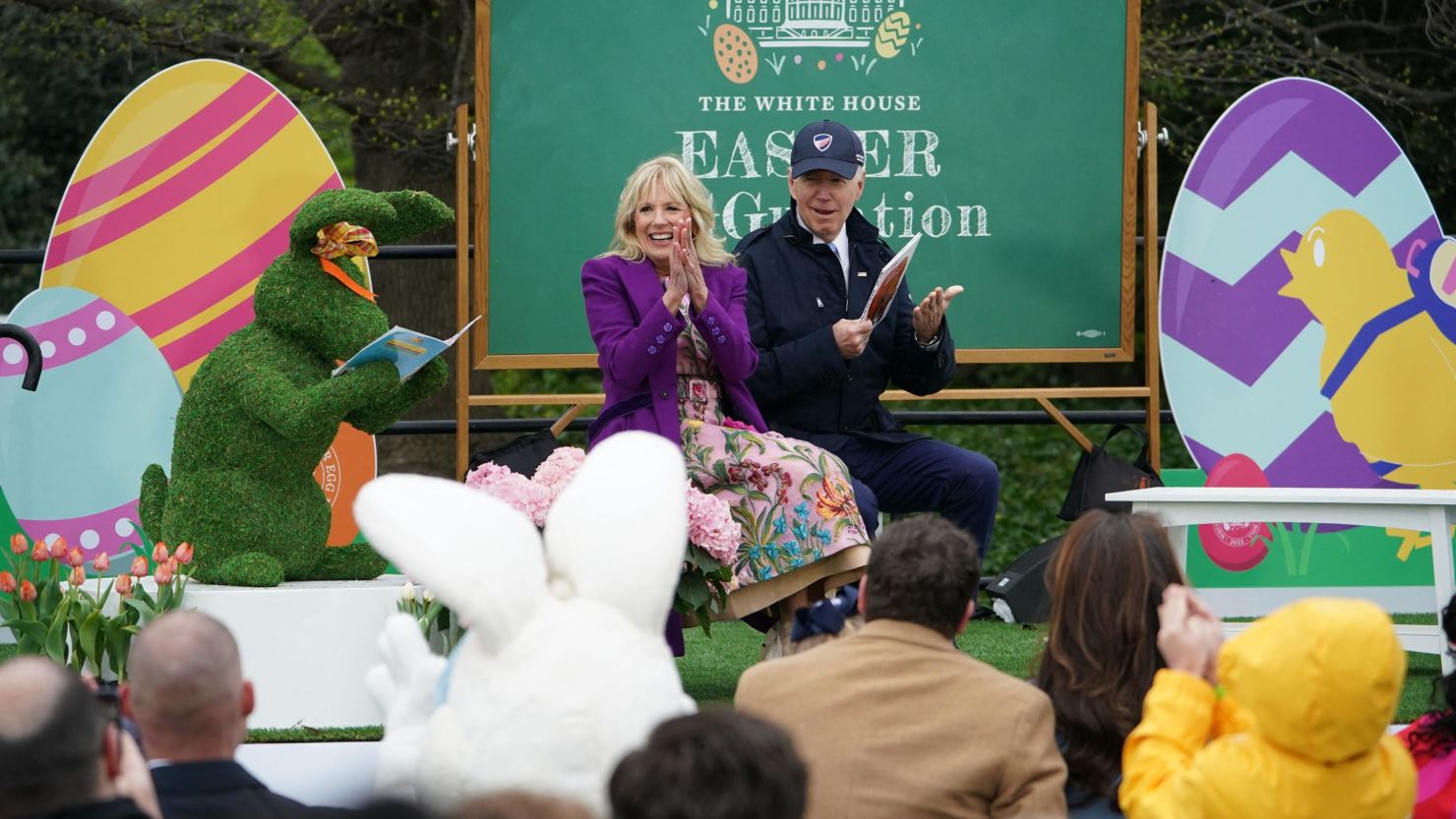 US President Joe Biden and First Lady Jill Biden read a book to children during the annual Easter Egg Roll on the South Lawn of the White House in Washington, DC on April 18, 2022. 