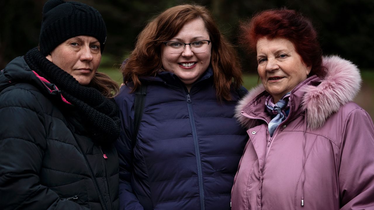 Mila Turchyn (center) was finally reunited with her mother Luba (right,) and sister Vita, (left) in Poland after a harrowing journey.