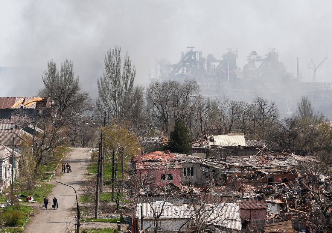 Smoke rises above the Azovstal plant as nearby buildings were flattened to the ground in Mariupol on April 18. 