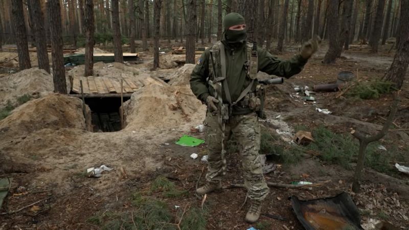 An abandoned Russian military camp in a forest near Kyiv reveals horrors of the invasion