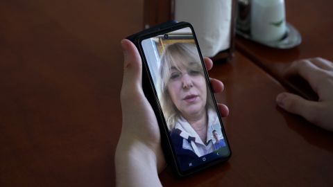 Mykyta Dudchenko speaks with his mother, who is in Ukraine, over the phone. 