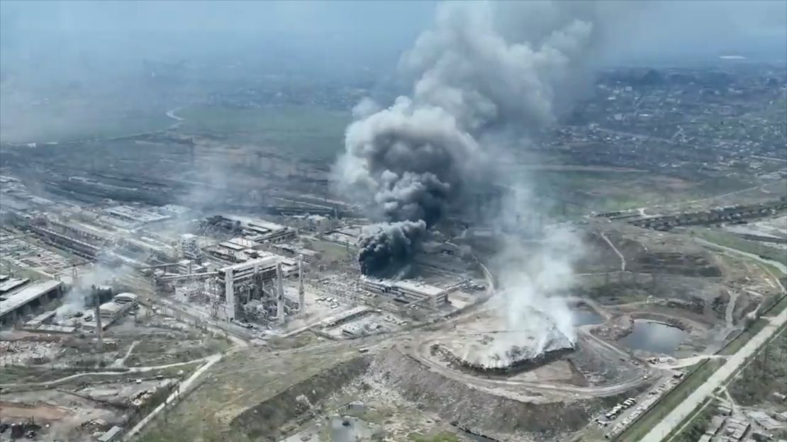 A drone image released by the Mariupol City Council on Monday, April 18, shows a large plume of smoke rising from the Azovstal steel plant.