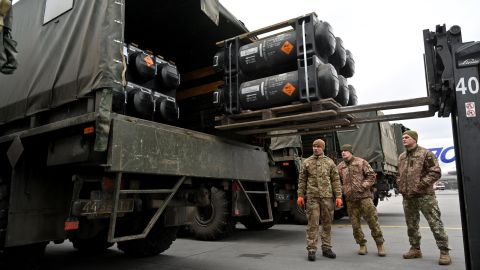 Ukrainian servicemen load a truck with Javelin anti-tank missiles.