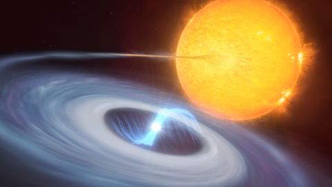 This illustration shows a two-star system. A blue disk of material can be seen swirling around a white dwarf as it pulls material away from a companion star.
