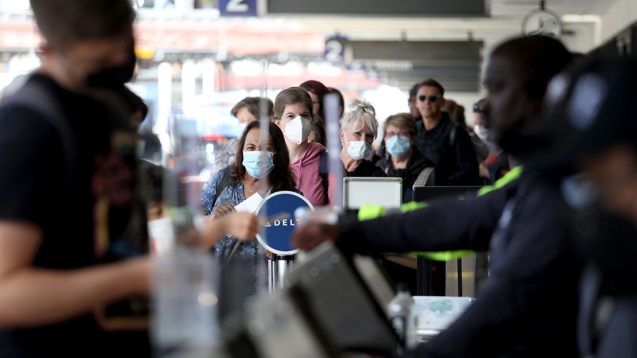 Passengers make their way through Delta Airlines Terminal Two at Los Angeles International Airport on Tuesday, April 19, 2022 in Los Angeles, CA.