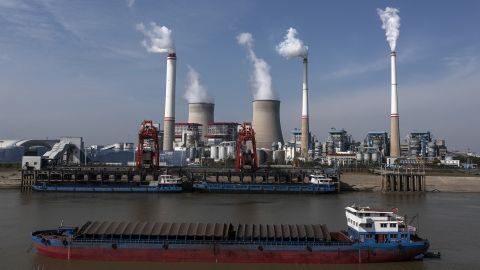 Ships carrying coal outside a coal-fired power plant in November 2021 in Hanchuan, Hubei province, China.