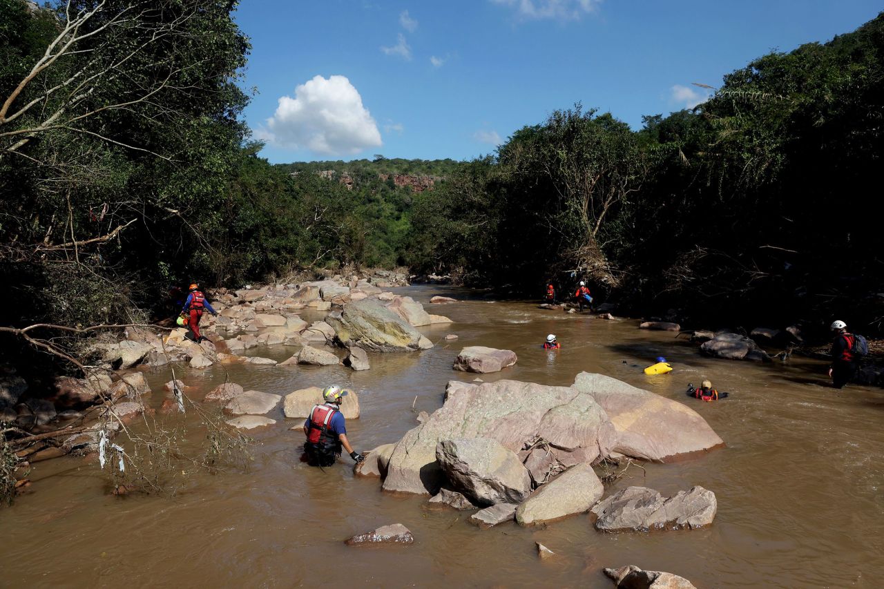 A search-and-rescue team attempts to recover a child's body at the Mzinyathi Falls near Durban on April 19.  