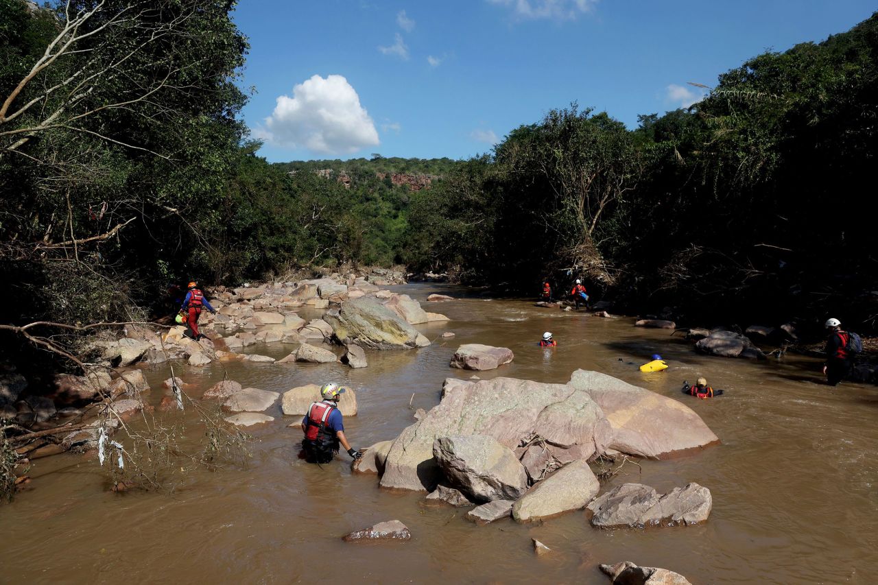 A search-and-rescue team attempts to recover a child's body at the Mzinyathi Falls near Durban on April 19.