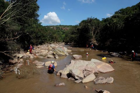 A search-and-rescue team attempts to recover a child's body at the Mzinyathi Falls near Durban on April 19.  