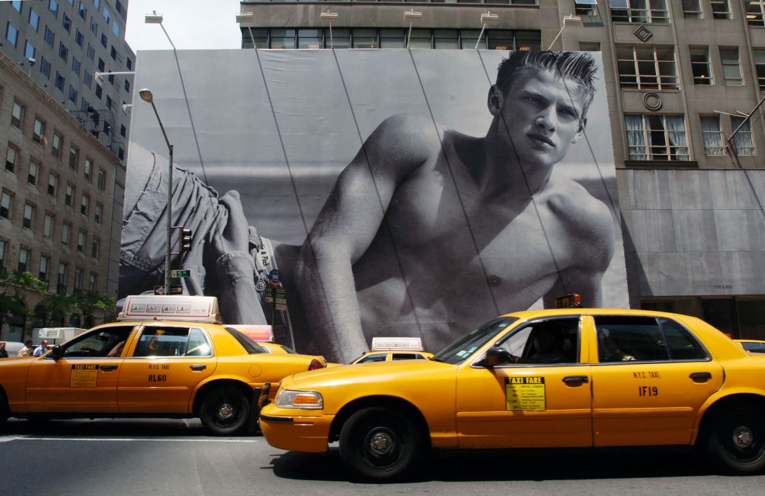Cabs drive in front of a Abercrombie & Fitch billboard in New York in 2005.