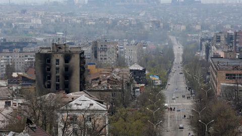 A view shows damaged buildings, with the Azovstal Iron and Steel Works plant in the background, in the southern port city of Mariupol on April 19, 2022.