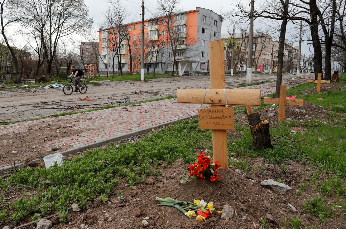 A view shows graves of civilians killed during the Ukraine-Russia conflict by the roadside in Mariupol on April 18, 2022.