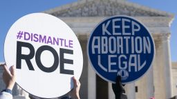 Pro-life activists counter-demonstrate as pro-choice activists participate in a "flash-mob" demonstration outside of the US Supreme Court on January 22, 2022 in Washington, DC. - January 22 marks the 49th anniversary of Roe v. Wade, the landmark case that established the constitutional right to abortion care in the United States. (Photo by Alex Edelman / AFP) (Photo by ALEX EDELMAN/AFP via Getty Images)