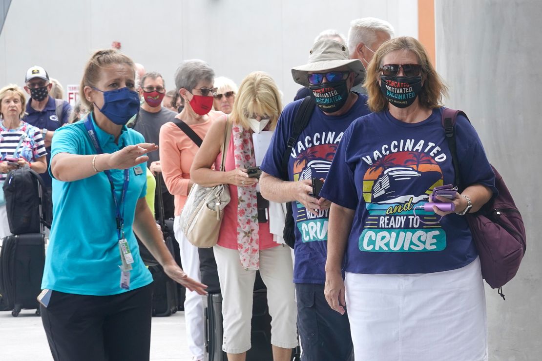 Passengers check into their cruise in Fort Lauderdale, Florida, on June 26, 2021. Celebrity Edge was the first cruise ship to leave a U.S. port since the coronavirus pandemic brought the industry to a 15-month standstill. 