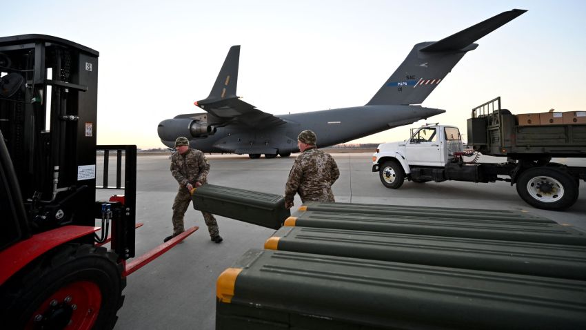 Servicemen of Ukrainian Military Forces move US made FIM-92 Stinger missiles, a man-portable air-defence system (MANPADS), that operates as an infrared homing surface-to-air missile (SAM), and the other military assistance shipped from Lithuania to Boryspil Airport in Kyiv on February 13, 2022. - Ukrainian leader Volodymyr Zelensky will speak to US President Joe Biden "in the coming hours", his office said on February 13, 2022, as Western fears grow that Russia is about to invade the ex-Soviet state. The talks come one day after the White House reported there had been no breakthrough during a one-hour phone conversation between Biden and Russian President Vladimir Putin. (Photo by Sergei SUPINSKY / AFP) (Photo by SERGEI SUPINSKY/AFP via Getty Images)