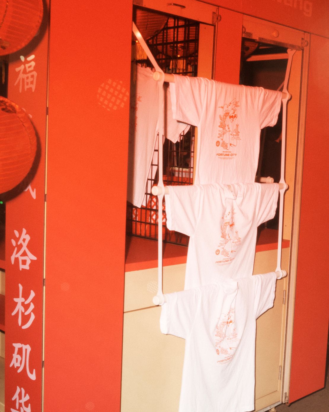 Limited edition commemorative T-shirts of the event were sold with proceeds going towards the Chinatown Corporation to assist with maintenance of the historic plaza where Fortune City was taking place.