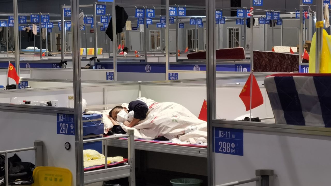 A man sleeps in a temporary hospital for people infected with Covid in Shanghai on April 19.