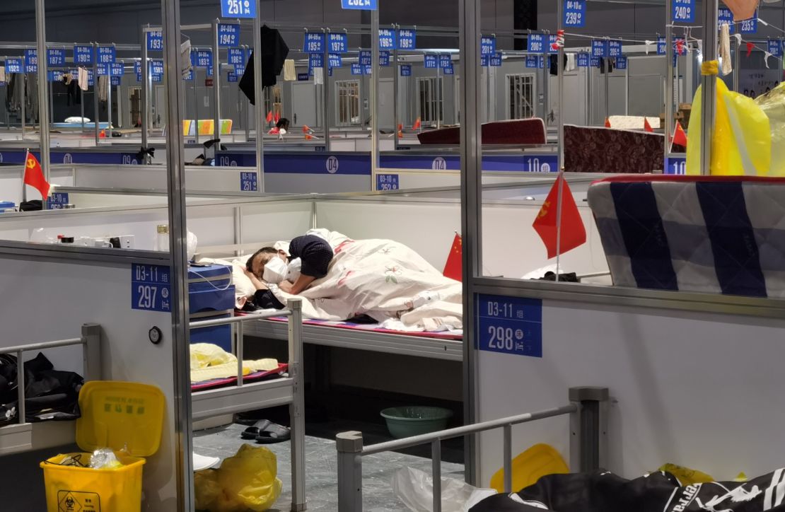 A man sleeps in a temporary hospital for people infected with Covid in Shanghai on April 19.