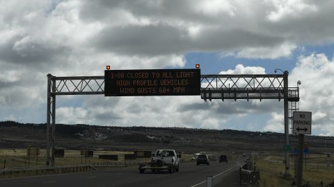 A road sign over I-25 on the outskirts of Laramie leading to Cheyenne, Wyoming, warns of high wind speeds on Friday, March 5, 2018.