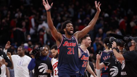 Joel Embiid celebrates his game-winning shot.