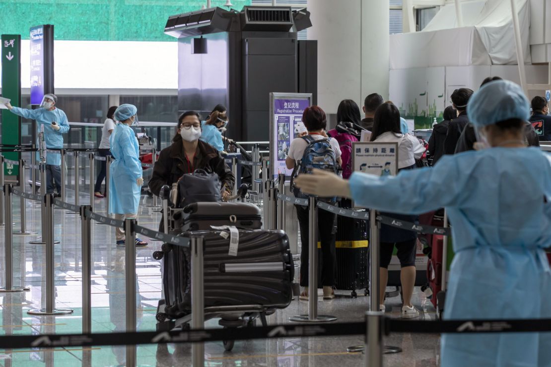 Travelers heading to quarantine at the Hong Kong International Airport on April 1.