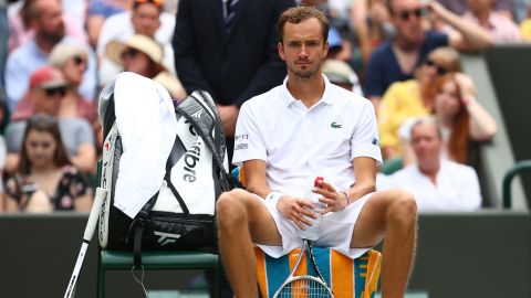 Daniil Medvedev sits between sets during his men's singles second round match against Carlos Alcaraz during day four of Wimbledon 2021.