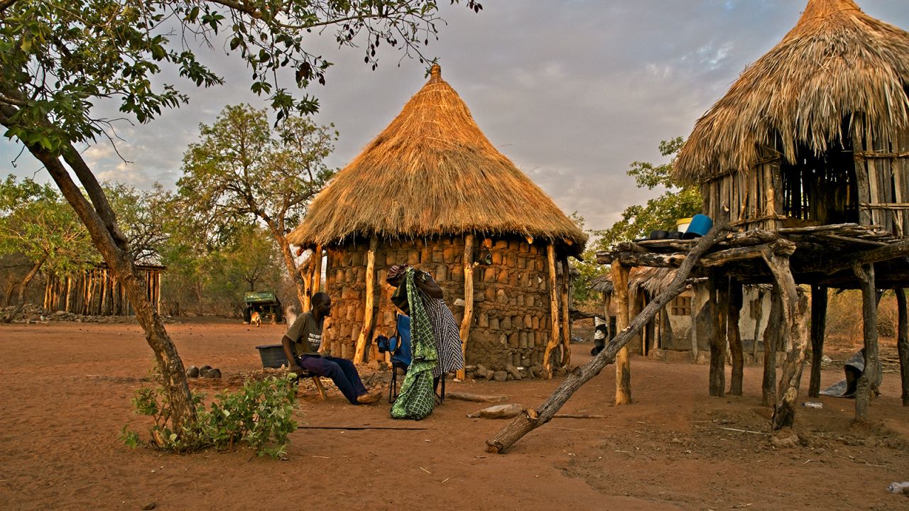 Brandina and Lawrence sitting at their homestead in Simatelele village on 02, November 2021. 