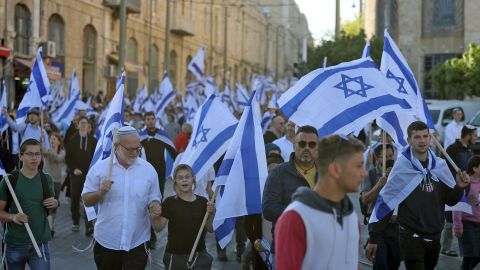 Israelis take part in a 'flag march' in Jerusalem organized by nationalist parties on Wednesday.