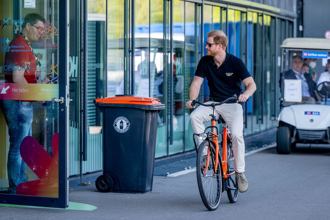 Prince Harry rides a bike at Zuiderpark in The Hague, during the Invictus Games.